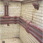St Edmunds College refurb Pic 006 - Before refurb - close up heating pipes